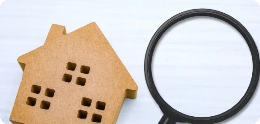 イメージ写真：家と虫眼鏡が写っています